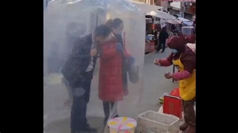 In China Couples Makeshift Shield Against Covid Outbreak Is