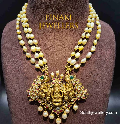 Pearl Necklace With Lakshmi Pendant Indian Jewellery Designs