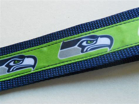 Seattle Seahawks Inspired Ribbon And Football Themed Wristlet Etsy