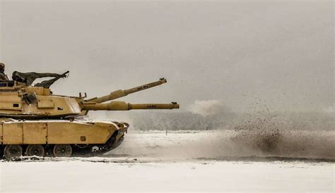 A Round Is Fired From An M1A2 Main Battle Tank Belonging NARA DVIDS