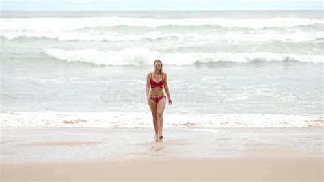 Woman In A Bikini Relaxes On A Sandy Beach At The Ocean Stock Video Video Of Girl Beautiful