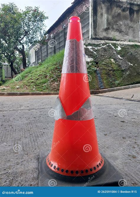 The DEVICE USED TO MANAGE TRAFFIC is the TRAFFIC CONE Stock Photo