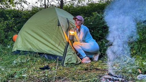 Young Girl Solo Overnight Camping Relaxing In The Tent With The Sound