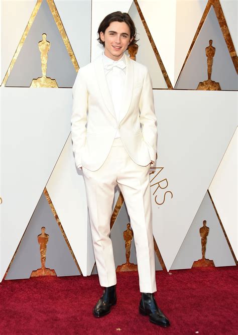 Timothée Chalamet Lights Up the 2018 Oscars in a White Berluti Suit | Vogue