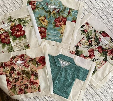 Four Different Types Of Flowered Shirts On A Table