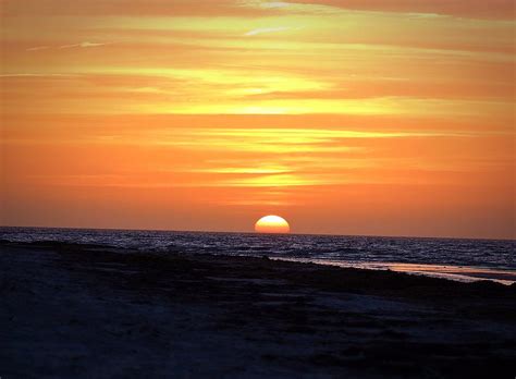 When A Sun Goes Down - When the Sun Goes Down.... Photograph by Peg Donnellan - Fine Art America
