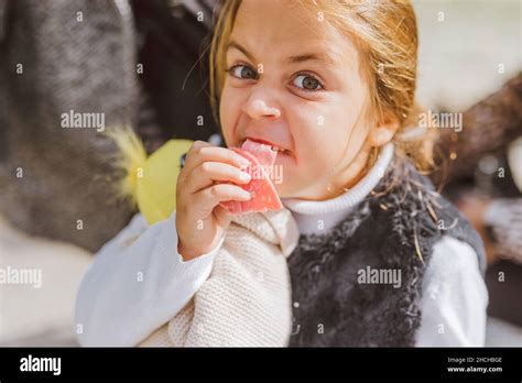 Caucasian Girl Making An Ugly Face While Eating Bologna Stock Photo Alamy