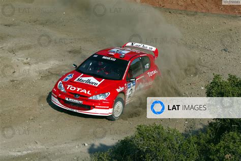 Richard Burns In Action In The Peugeot 206 WRC Acropolis Rally 2003