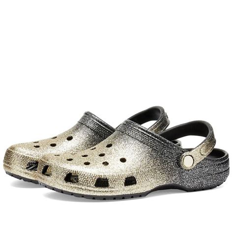 Crocs Women's Classic Ombre Glitter Clog in Black/Gold Crocs