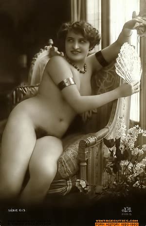 Short Haired Curly Brunette Gets Naked And Smiles Happil XXX Dessert