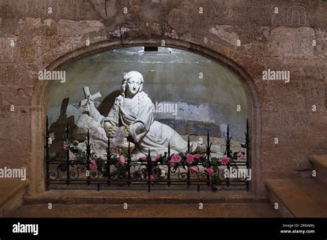 Sculpture Of Mary Magdalene Next To Her Tomb In Church Or Basilica Of