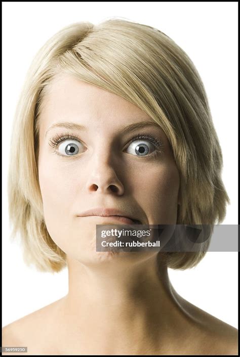 Portrait Of A Young Woman Making A Face High Res Stock Photo Getty Images