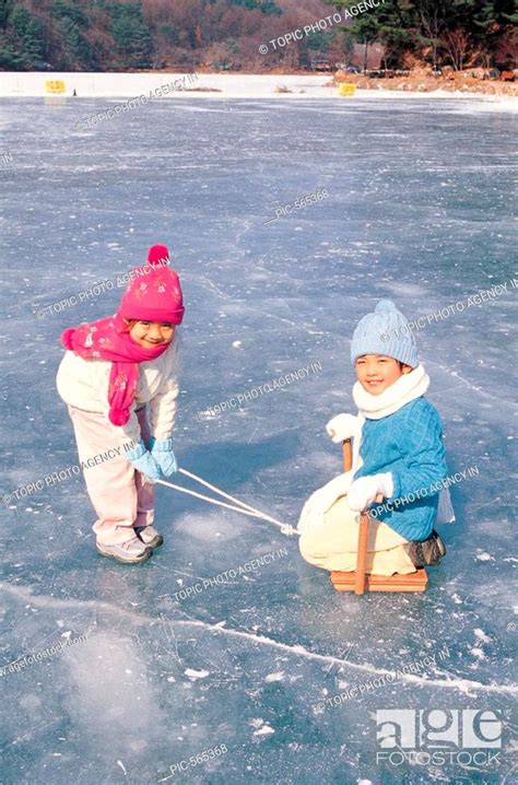 Kids Sledding On Ice Korean Stock Photo Picture And Rights Managed