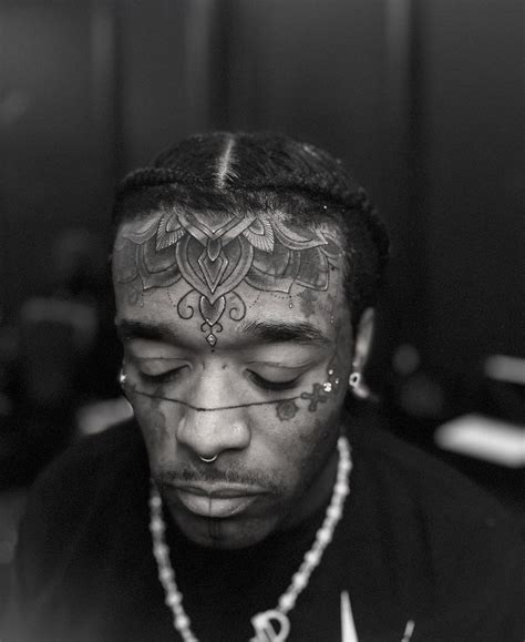 Lil Uzi Vert shows off new tattoos on forehead and tongue