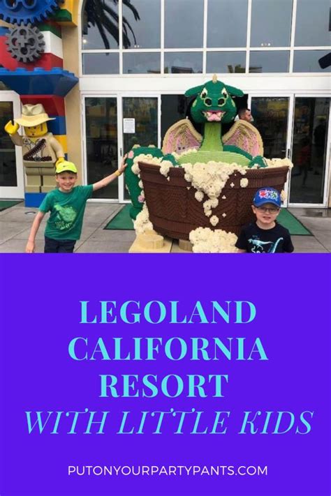 legoland california resort with little kids in front of it and the ...