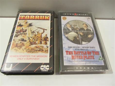 Two War Film Vhs Tapes Tobruk And Battle Of The River Plate £400