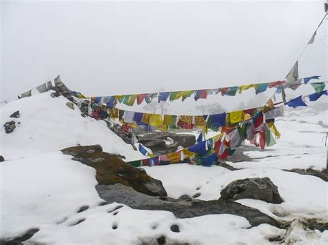 Buddhist Prayer Flags On A Snow Capped Mountain Stock Photo Image Of