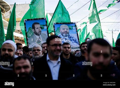 Images of Hamas leaders seen among supporters during a rally marking ...