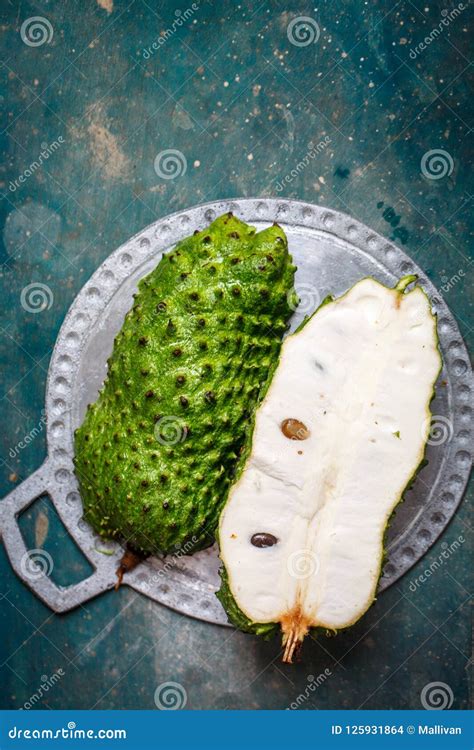 Cut fruit of guanabana stock photo. Image of close, juicy - 125931864