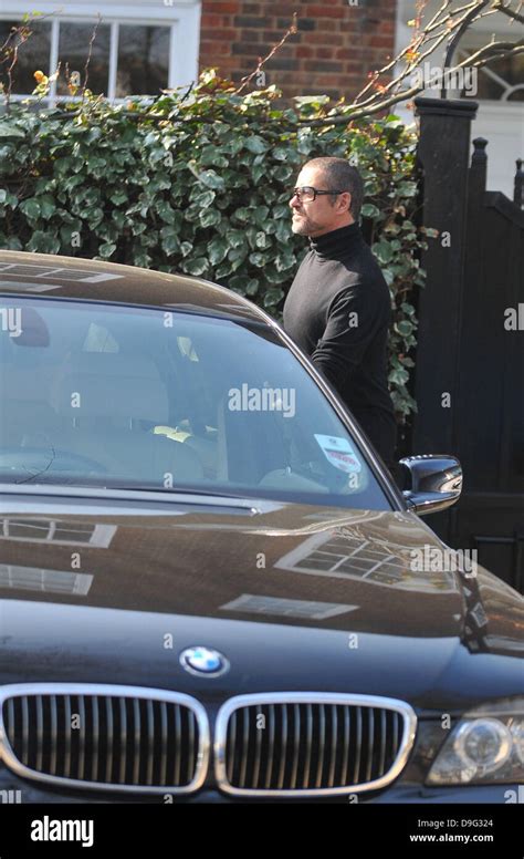 George Michael Is Picked Up By A Chauffeur Driven Bmw Outside His House