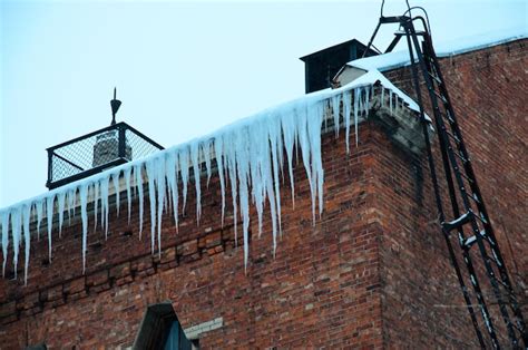 Premium Photo Icicles Hanging From The Roof