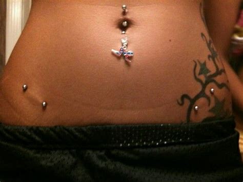 Hip Piercing With Tattoo