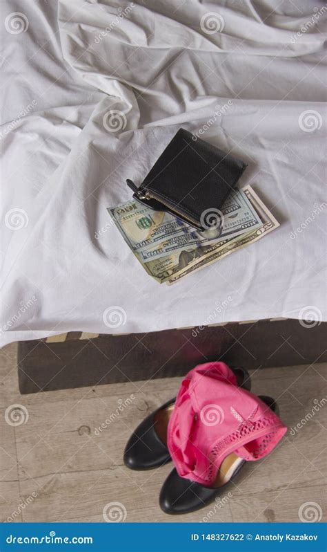 Love For Money Is Prostitution Crumpled Bed Underwear And Money As Payment For Sex Stock Photo