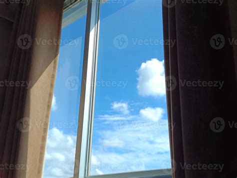 The window from the bedroom overlooks the daytime sky. 12923803 Stock ...