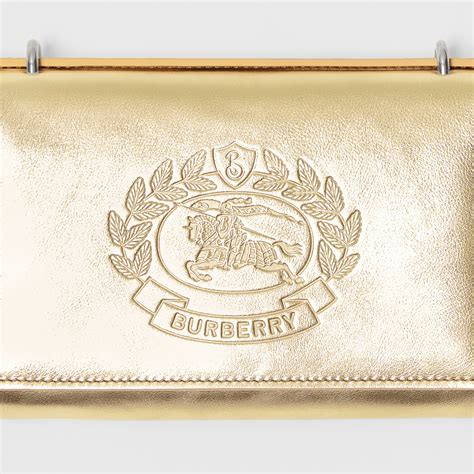 Embossed Crest Metallic Leather Wallet With Detachable Strap In Gold