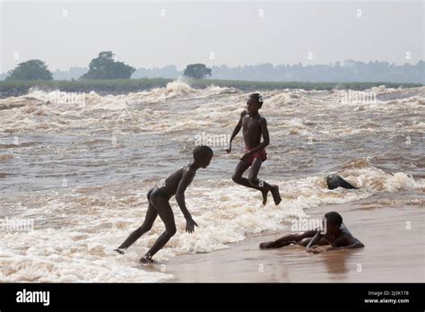 Young Congolese boys at play along the Zaire River at Kinsuka Rapids ...