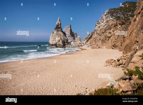 Towering Rock Cliffs At Praia Da Ursa Beach Sintra Portugal Atlantic