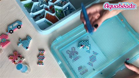 Aquabeads дельфин из бусин Аквабидс - YouTube