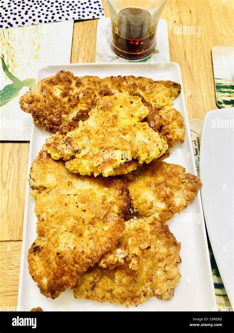 Breaded Pork Schnitzel Stock Photo Alamy