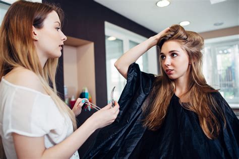 Hair Stylist Working On Female Customer S Hairdo Clipping Strands With Hair Pins In Hairdressing