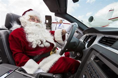 Santa Driving Convertible At Airport Terminal — Stock Photo