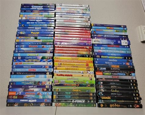 LOT OF 100 DVDs Kids & Family Children's Baby Avatar Scooby Barbie