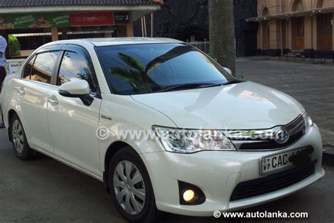 Toyota Axio Hybrid Nke G Grade