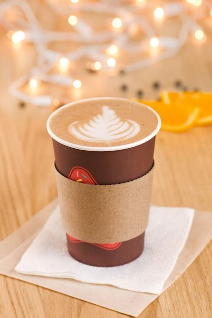 Premium Photo Cappuccino In A Takeaway Cup