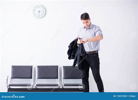 The Man Nervously Impatiently Waiting In The Lobby Stock Image Image