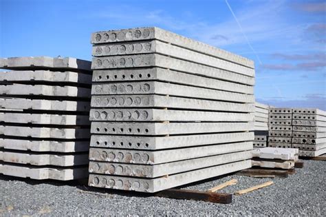 Premium Photo Stack Of Grey Precast Concrete Slabs At A Construction Site