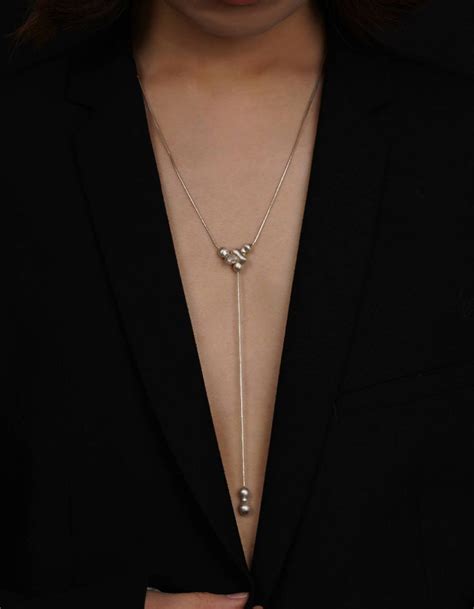 This Sliding Necklace Subtly Pushes The Notion Of Dimensional Wearing