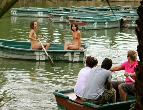 Happy Embarrassed Naked Girls In A Boat Porn Pic