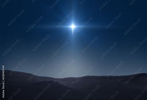 Star of Bethlehem, or Christmas Star. Bright star in the dark blue ...