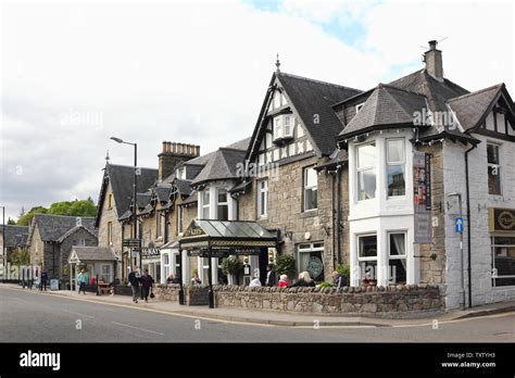 Victorian Style Houses And Outside Restaurant In Scotland Stock Photo