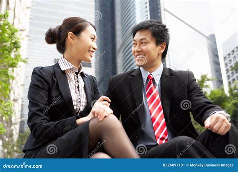 Chinese Businessman And Businesswoman Stock Image Image Of Sitting