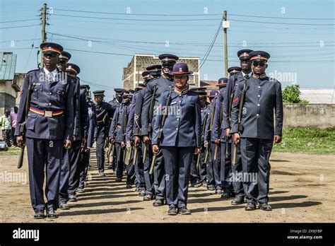 Kenyan Police Officers Wearing Ceremonial Uniform March During The