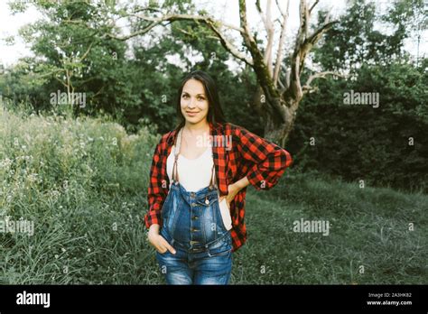 Portrait Of A Pregnant Brunette Woman Stock Photo Alamy