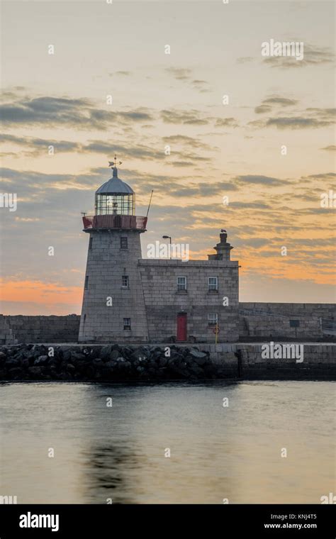 Howth Lighthouse in Dublin at sunrise Stock Photo - Alamy