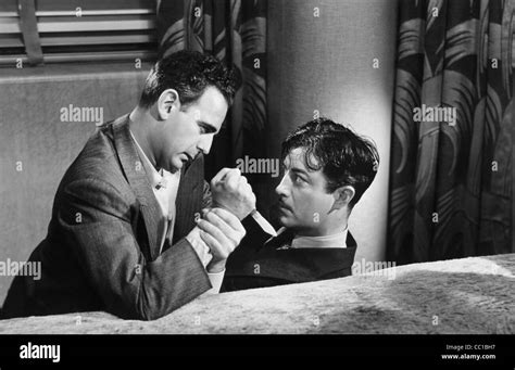 PAUL STEWART, ROBERT TAYLOR, JOHNNY EAGER, 1941 Stock Photo - Alamy