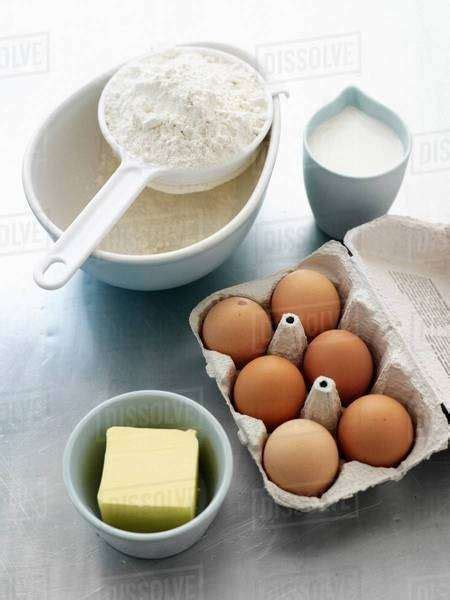 Flour Eggs Milk And Butter Stock Photo Dissolve